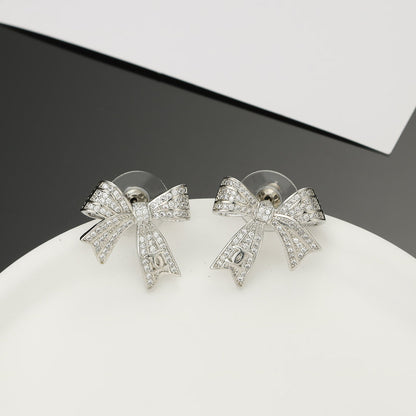 18K  Chanel Bow Tie Diamond Earrings