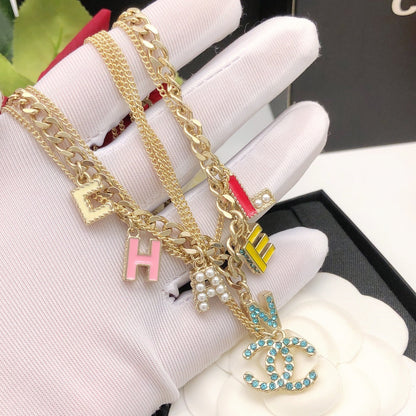 18K  Chanel Color Typo Necklace